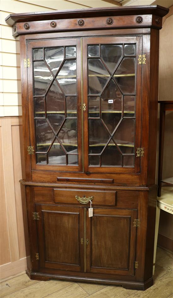 A George III mahogany standing corner cabinet H.213cm